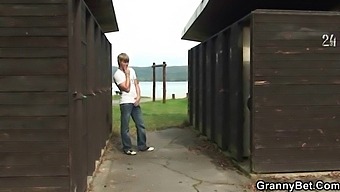 Older Woman Gets Intimate With Younger Man In A Public Restroom